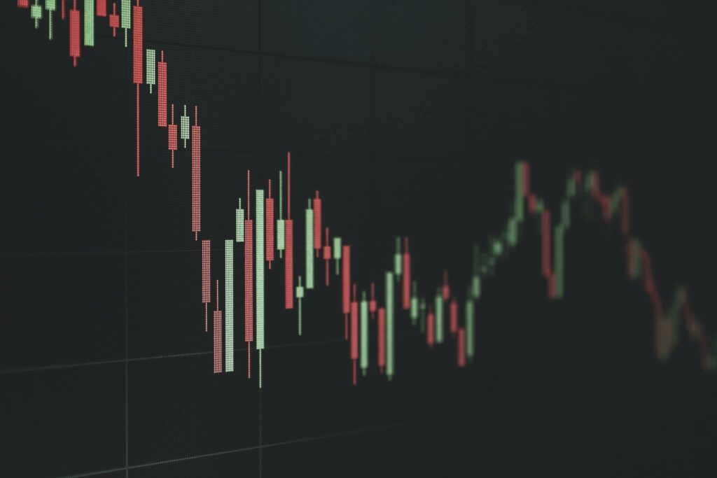 Stock market data chart showing trends in red and green. Perfect for financial and business themes.